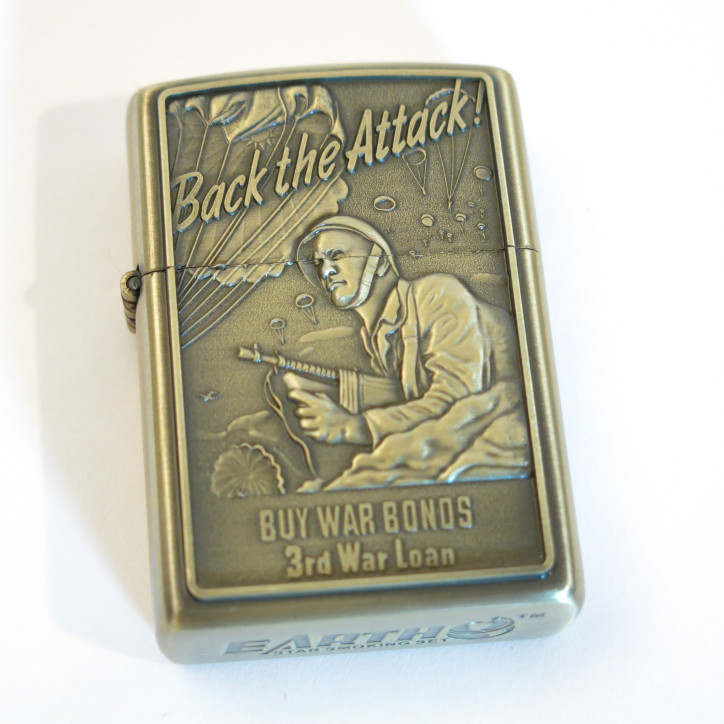 Briquet style Zippo  Back the attack 