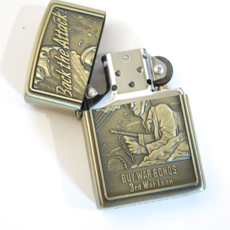 Briquet style Zippo  Back the attack 