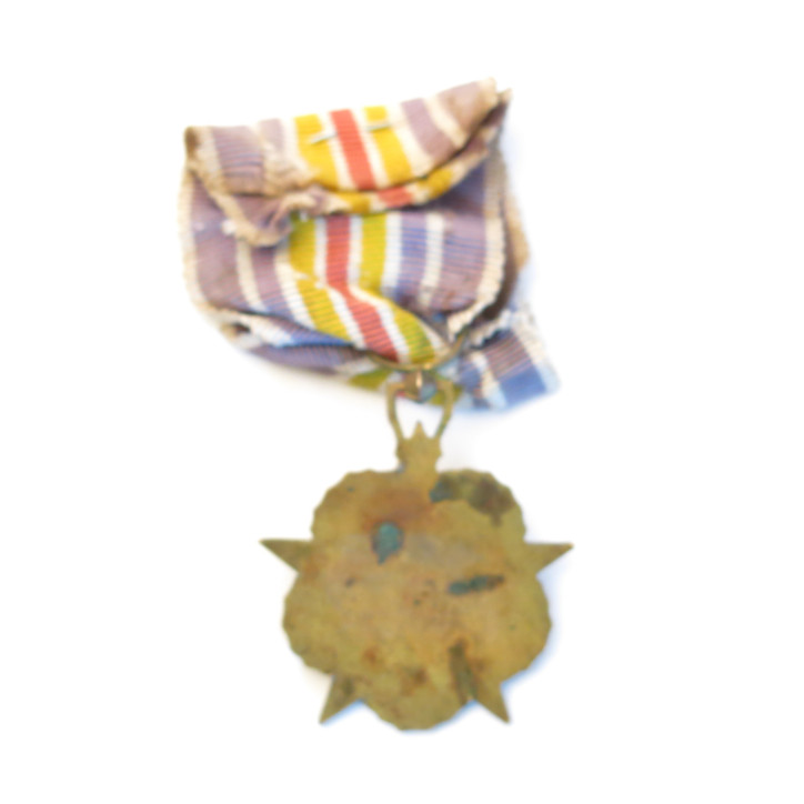 Médaille des blessés émaillée Indo Réf bo 12 un
