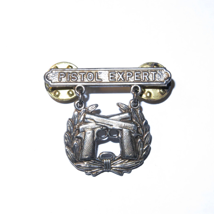 Badge qualification  tireur Colt 45 US Army 1944 bo 52 