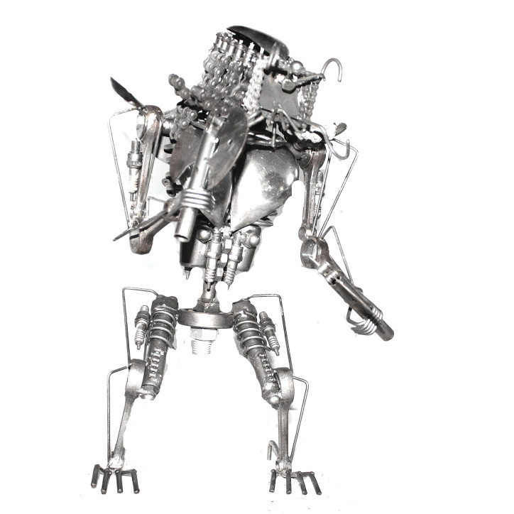 Statuette métallique du Predator avec doubles haches
