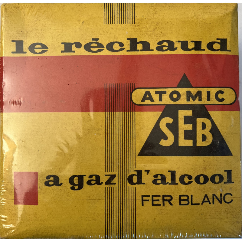 Le réchaud ATOMIC SEB à gaz d'alcool en fer blanc encore sous plastique