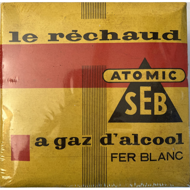 Le réchaud ATOMIC SEB à gaz d'alcool en fer blanc encore sous plastique